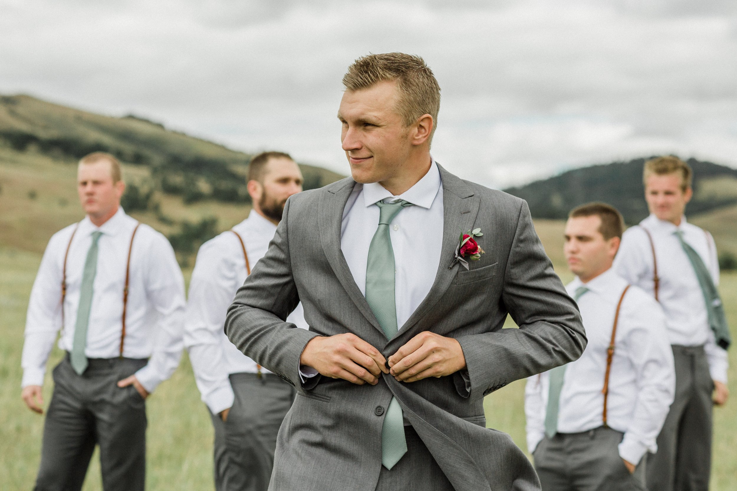 groomsmen photo with grey suits and green ties (Copy)