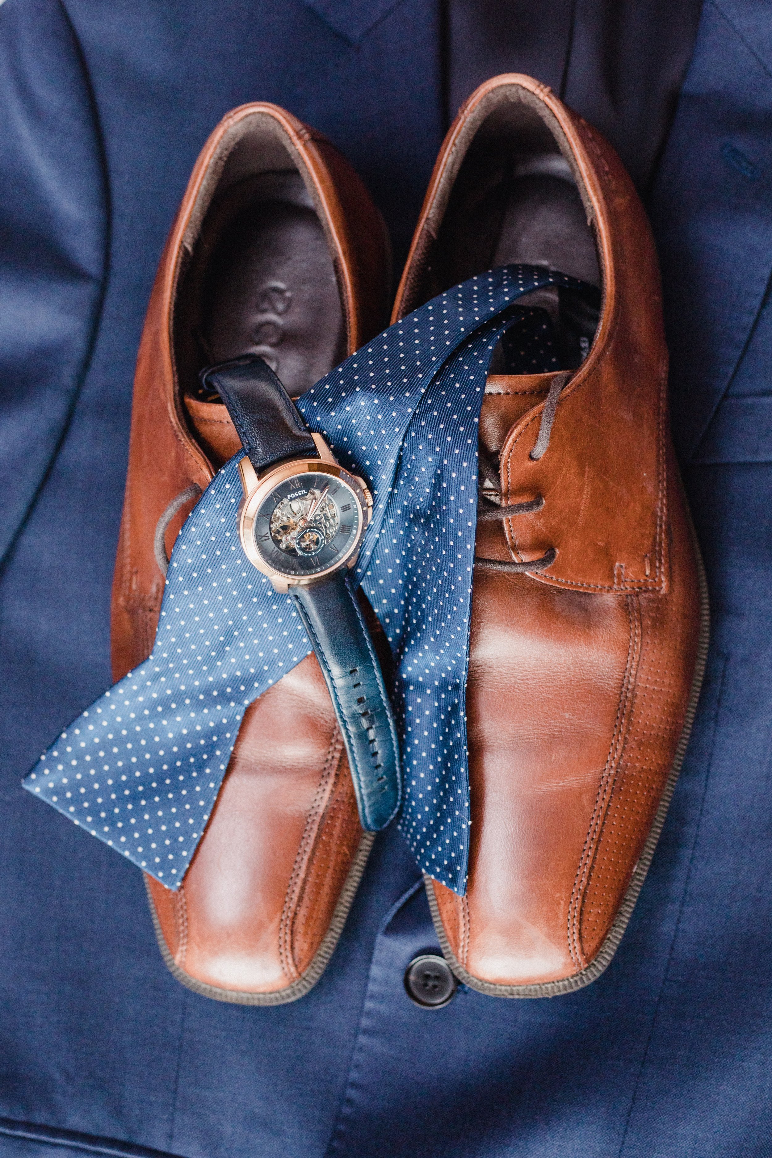 groom with navy blue suit bow tie and dress shoes (Copy)