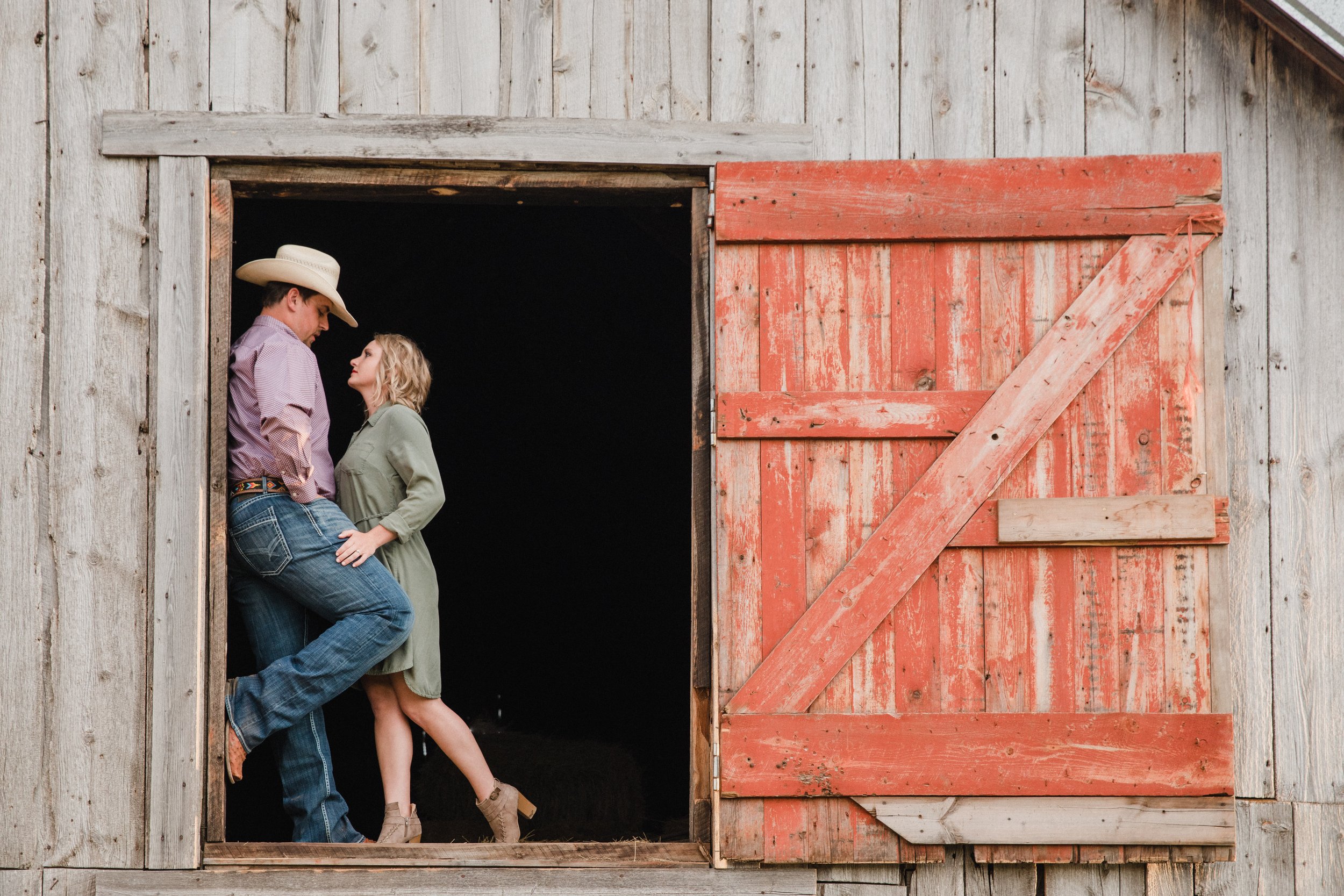 western couple standing in barn in new underwood south dakota (Copy)
