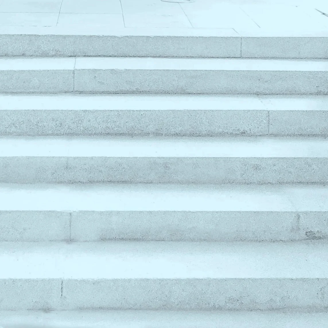 Concrete steps going up.