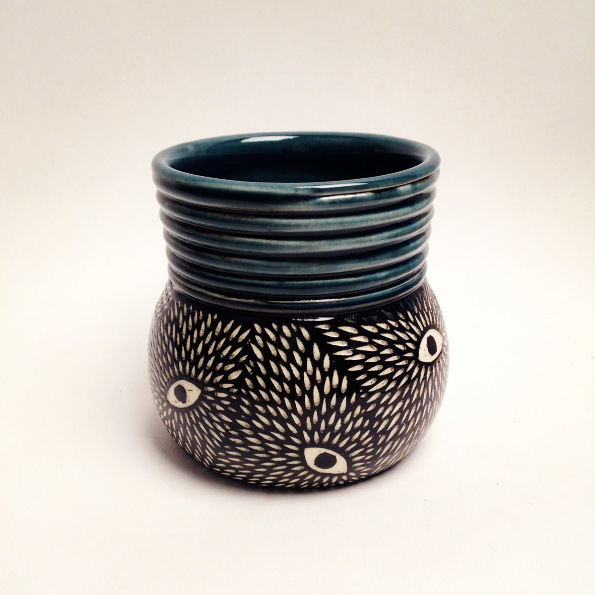 Tumbler, 2014. Underglaze on while stoneware, glazed and fired to cone 6 oxidation.