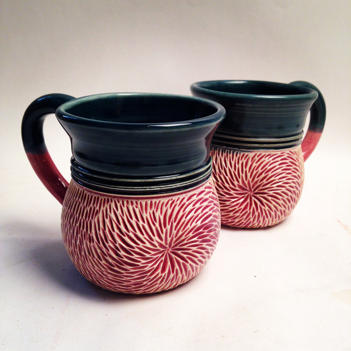 Mugs, 2014. White stoneware, glazed and fired to cone 6 oxidation.