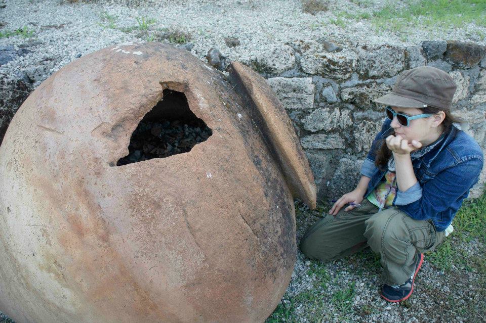 Staring down a dolium, or large storage vessel, Pompeii, Italy, 2014. Photo courtesy Caroline Cheung.