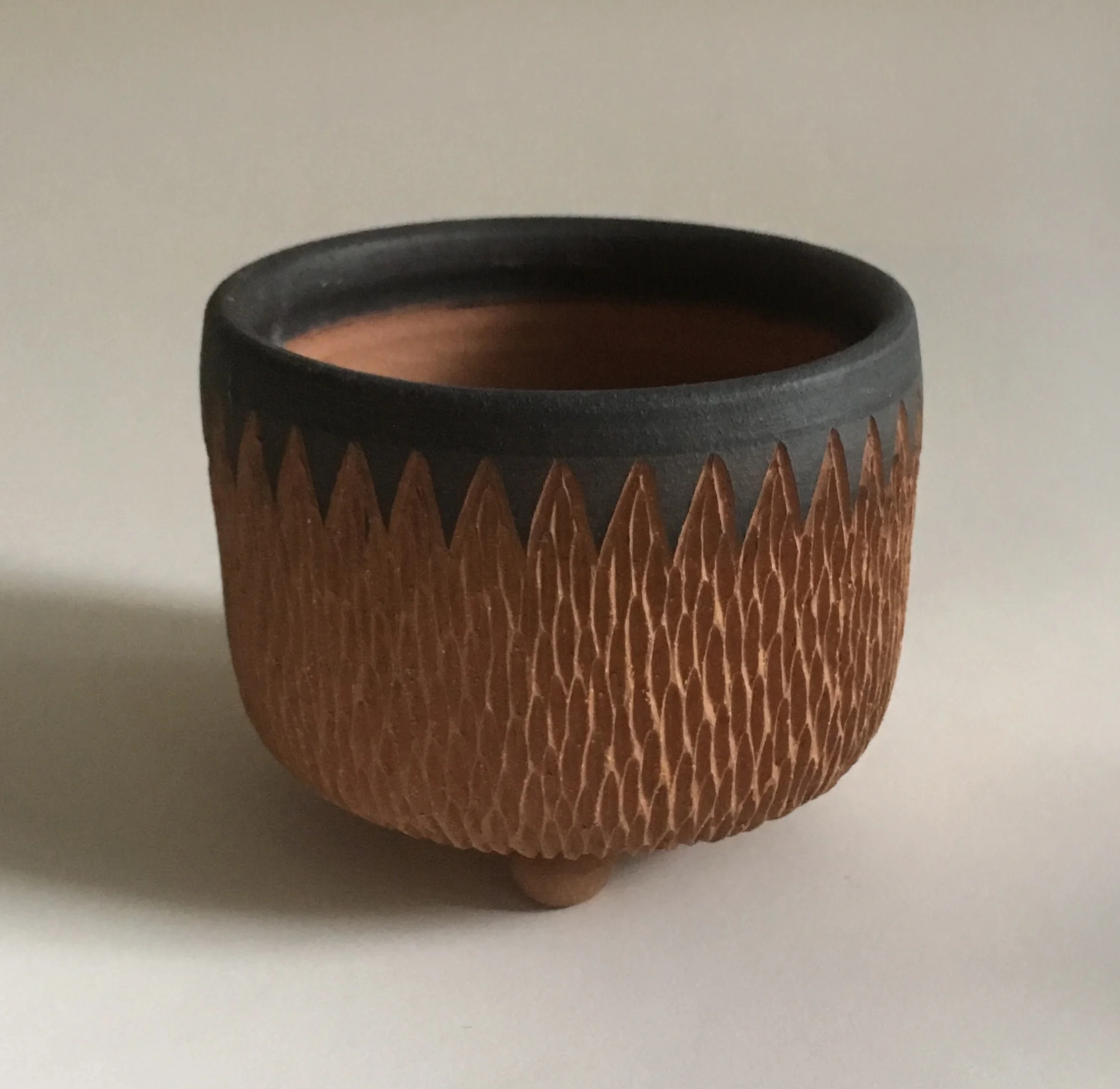 Red stoneware planter