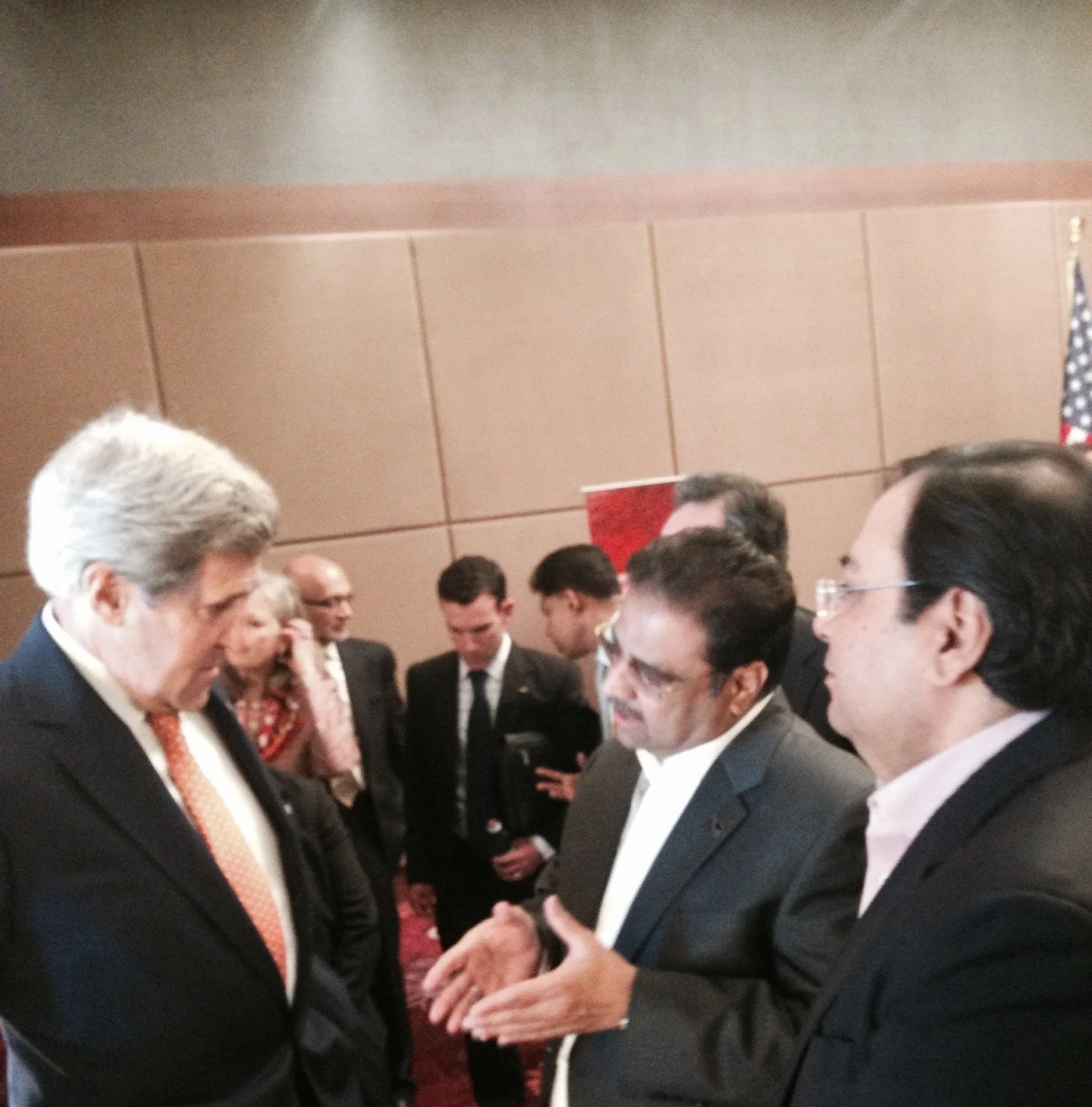 Suresh Nichani, Vice Chairman of RootCorp (right) with Honorable John Kerry, United States Secretary of State (left), and Mr. Danny Gaekwad (middle).