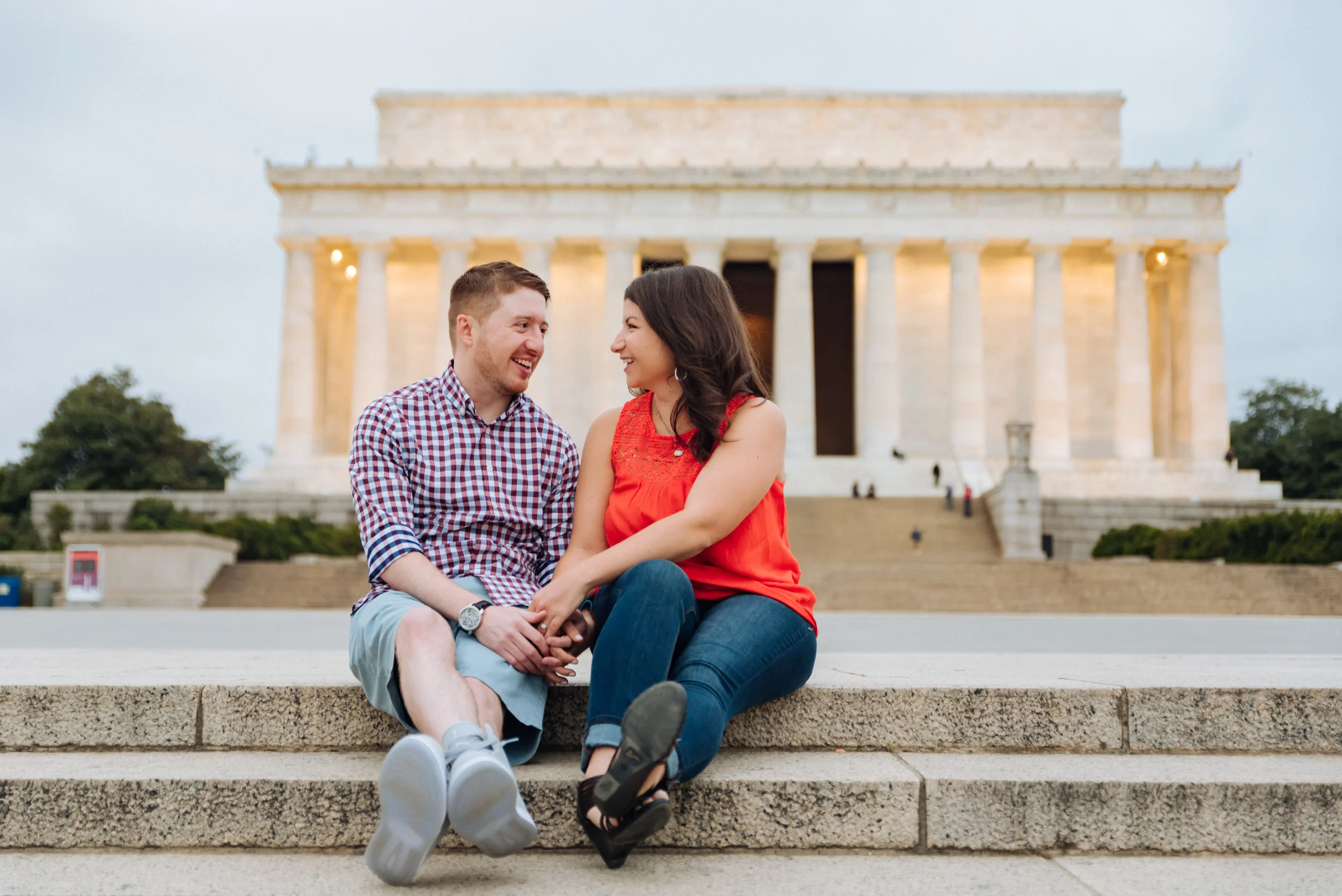 ATHENS IS WHERE OUR STORY BEGINS…. Lauren and Ryan met in September 2007 while attending the one and only Ohio University in Athens. Exactly where did they meet? As surprising as it may seem, Lauren and Ryan met in class. On a Friday afternoon, Lauren and Ryan were both attending their sociology class. On this particular day, students in the class were going to have a debate. Lauren and Ryan only observed, but, unbeknownst to each other, both felt strongly about what was being said. Lauren, being the introvert she is, remained quiet in her seat about her reaction to the debate. Ryan, on the other hand, being outspoken and the extrovert he is, raised his hand, stood up in the lecture hall, and volunteered a piece of his mind. It was enough to make Lauren notice, so she turned around from her nerdy second-row seat (Ryan sat in the back row of the lecture hall, of course) to see who this person was. And what did Lauren see? She saw someone with moppy red hair, skater shoes, gym shorts, and a hoodie… but about as short in stature as Lauren herself. Who WAS this guy? Lauren had to find out. Class finally ended, and Lauren hung back a little so she would pass ways with this interesting (and loud…) red-headed guy. It was at this point Lauren and Ryan met, and struck up a conversation about what they just saw in class. They ended up carrying the conversation all of the way back to OU’s Front Four dorms, where they both lived. Is this the part where Ryan asked for Lauren’s number, or vice versa? Actually, no. Lauren and Ryan didn’t talk or see each other again... until a few months later. 
