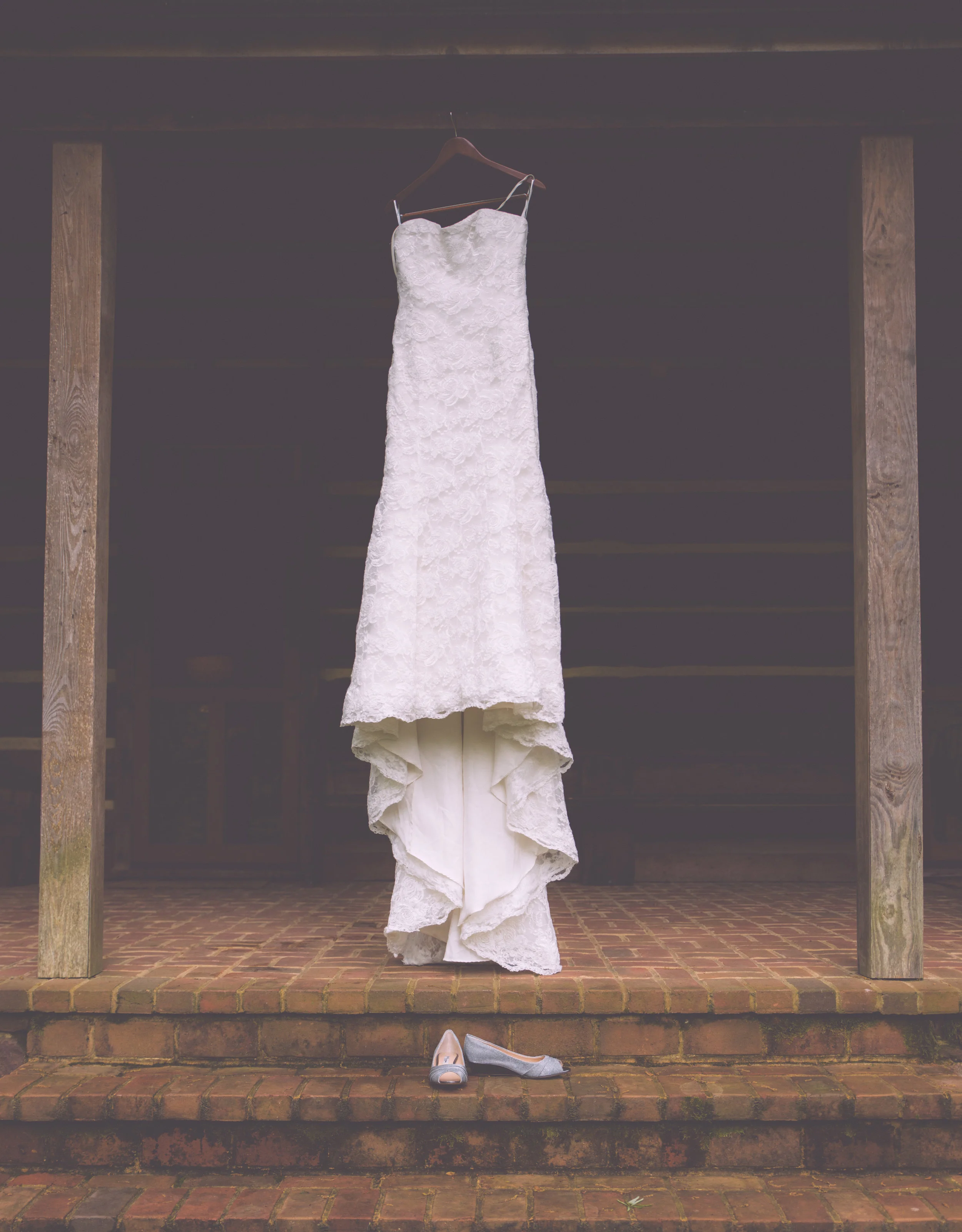 Brides Dress and shoes hanging outside