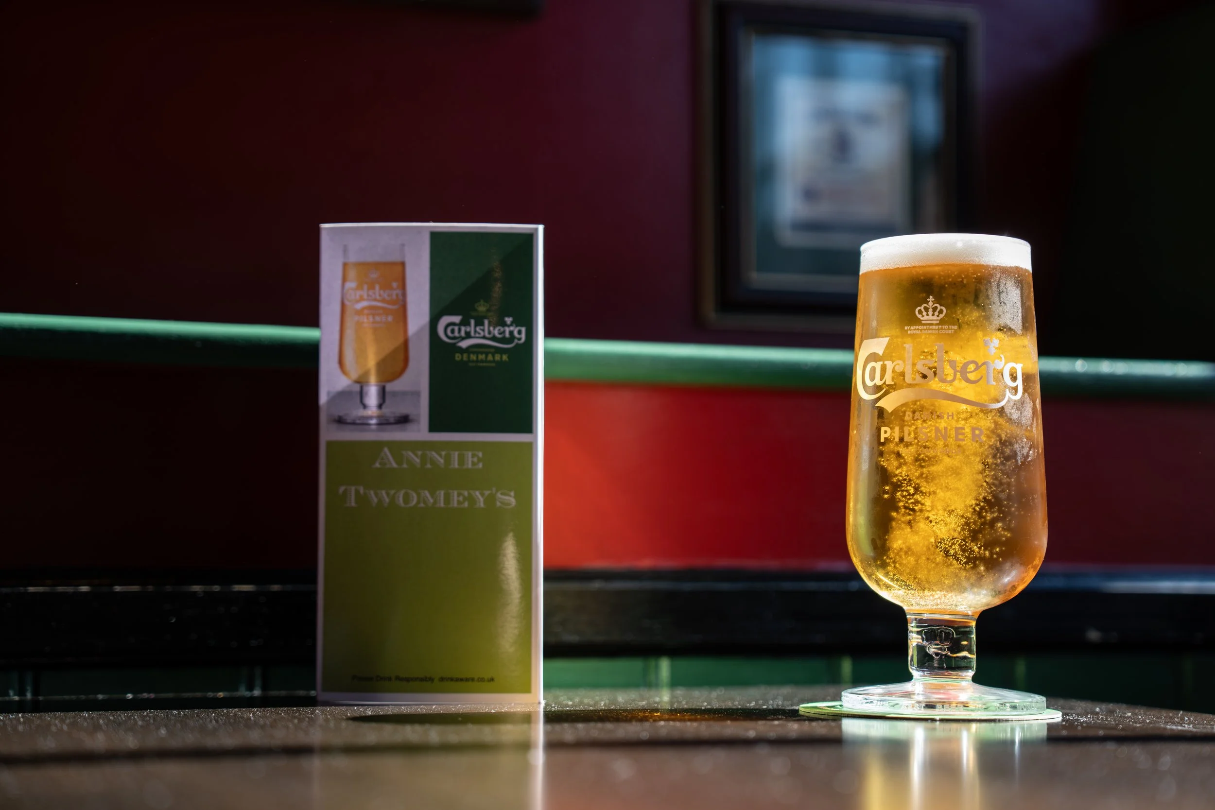 Carlsberg pint on the table at Annie Twomey's — video above