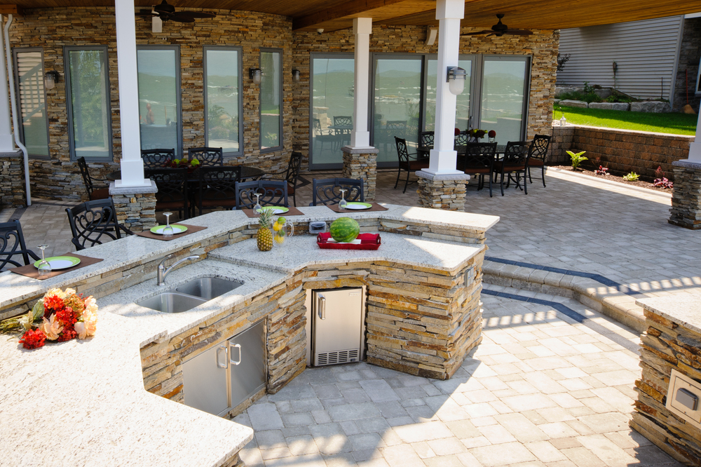 Esch Landscaping - Outdoor Living - Full Outdoor Kitchen with Bar for Entertaining .jpg
