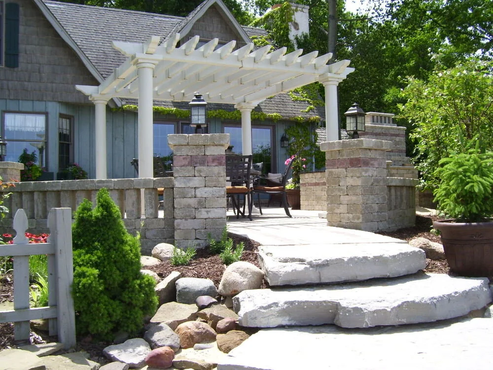 Esch Landscaping - Retaining Wall - Seat Wall with Pergola.jpeg