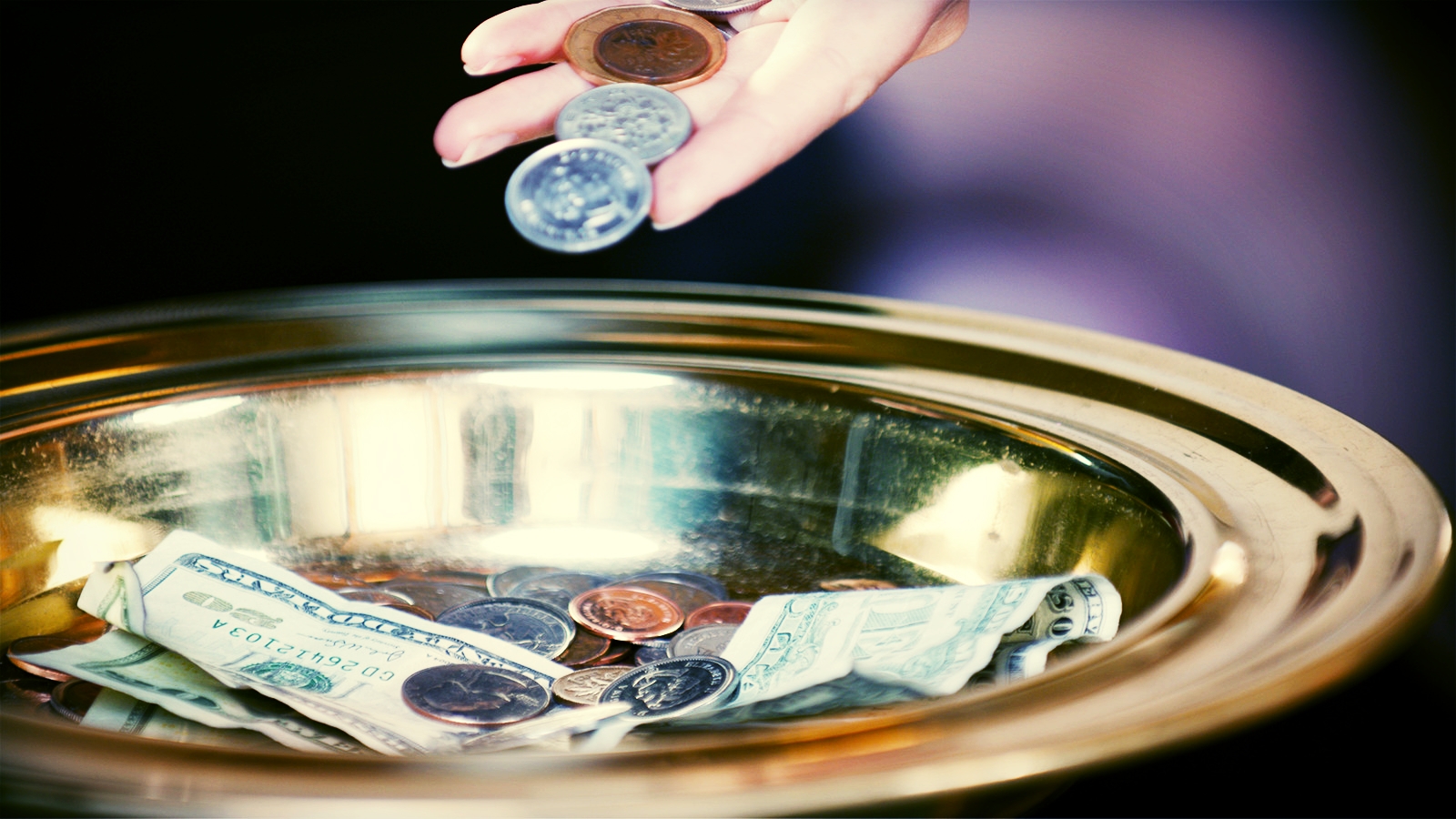 33636-tithing-money-giving-church-offering.1200w.tn.jpg