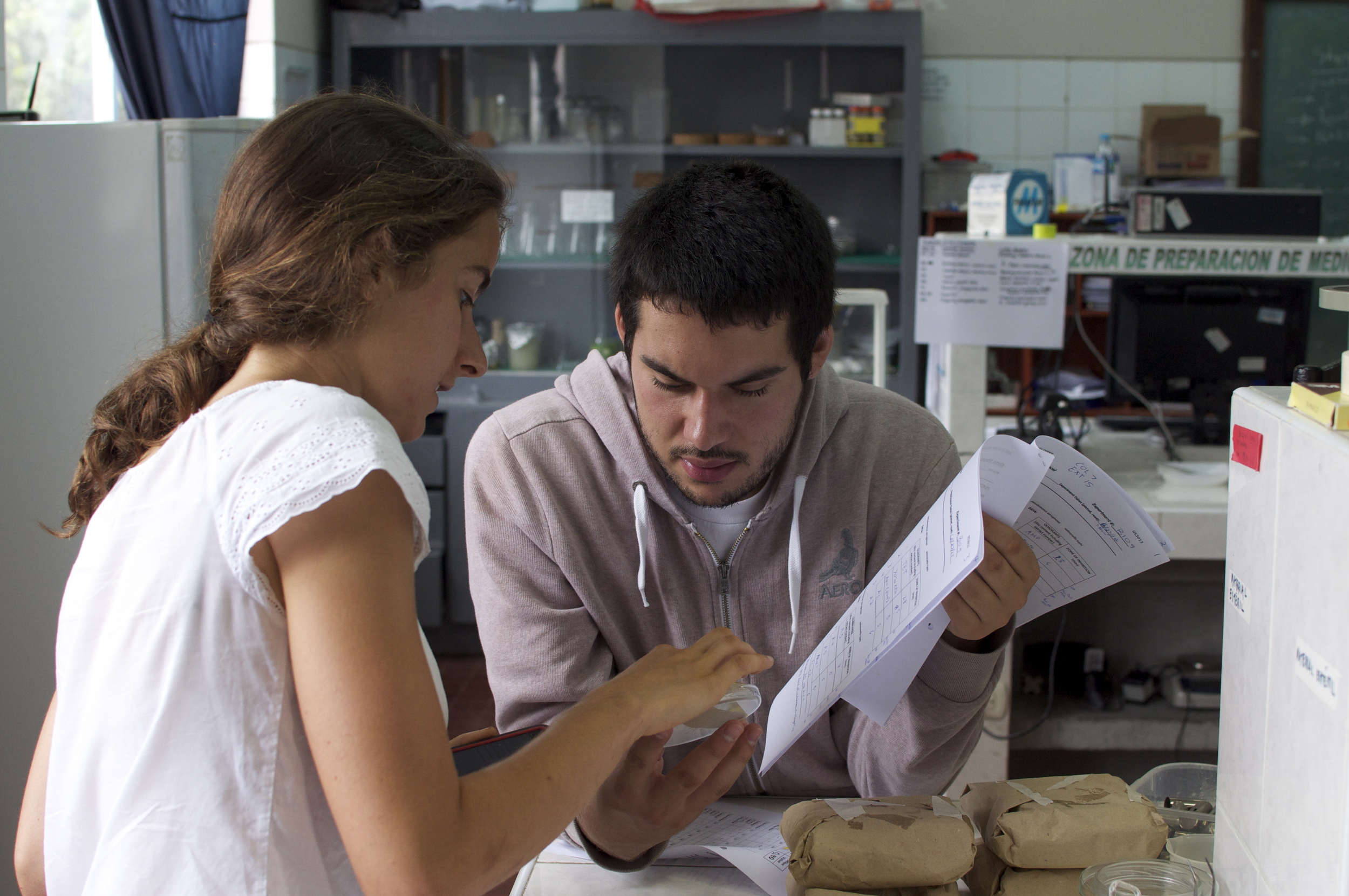 Summer 2014 - MHIRT student Abel Arellano works with with Carolyn Gigot, a Harvard student working in the UNT lab, to see if Peruvian medicinal plants have antibacterial properties. 
