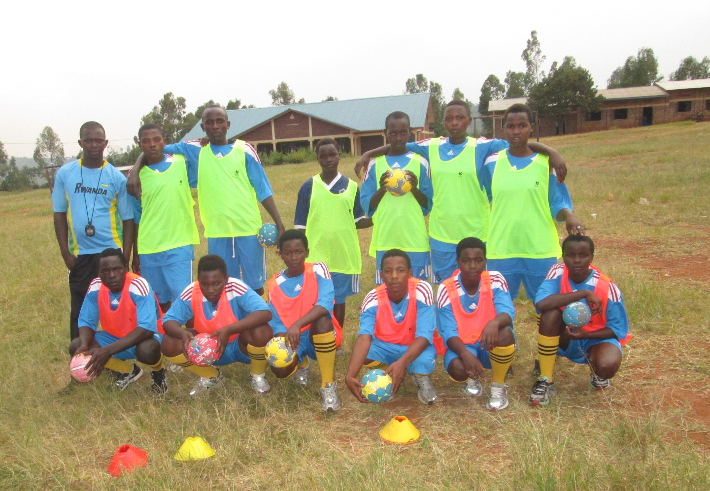 Duha handball team with coach, aphrodice sindayigaya