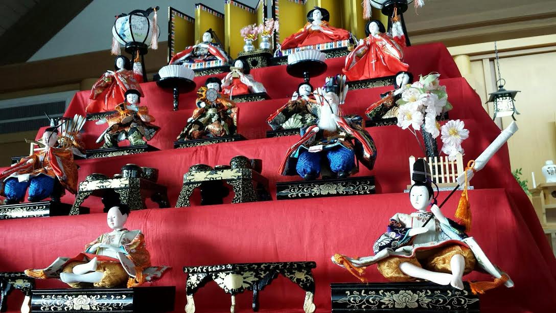 Hinamatusuri (Girls' Day) at Konko-Kyo Church. The Japanese Doll Festival (Hinamatsuri), or Girls' Day, is a festival celebrated by families who have girls, wishing their daughters good health and growth. Traditionally, beautiful dolls representing the emperor, empress, attendants, and musicians were handcrafted especially for the occasion. The custom of displaying dolls began during the Heian period, when people believed the dolls possessed the power to contain bad spirits.