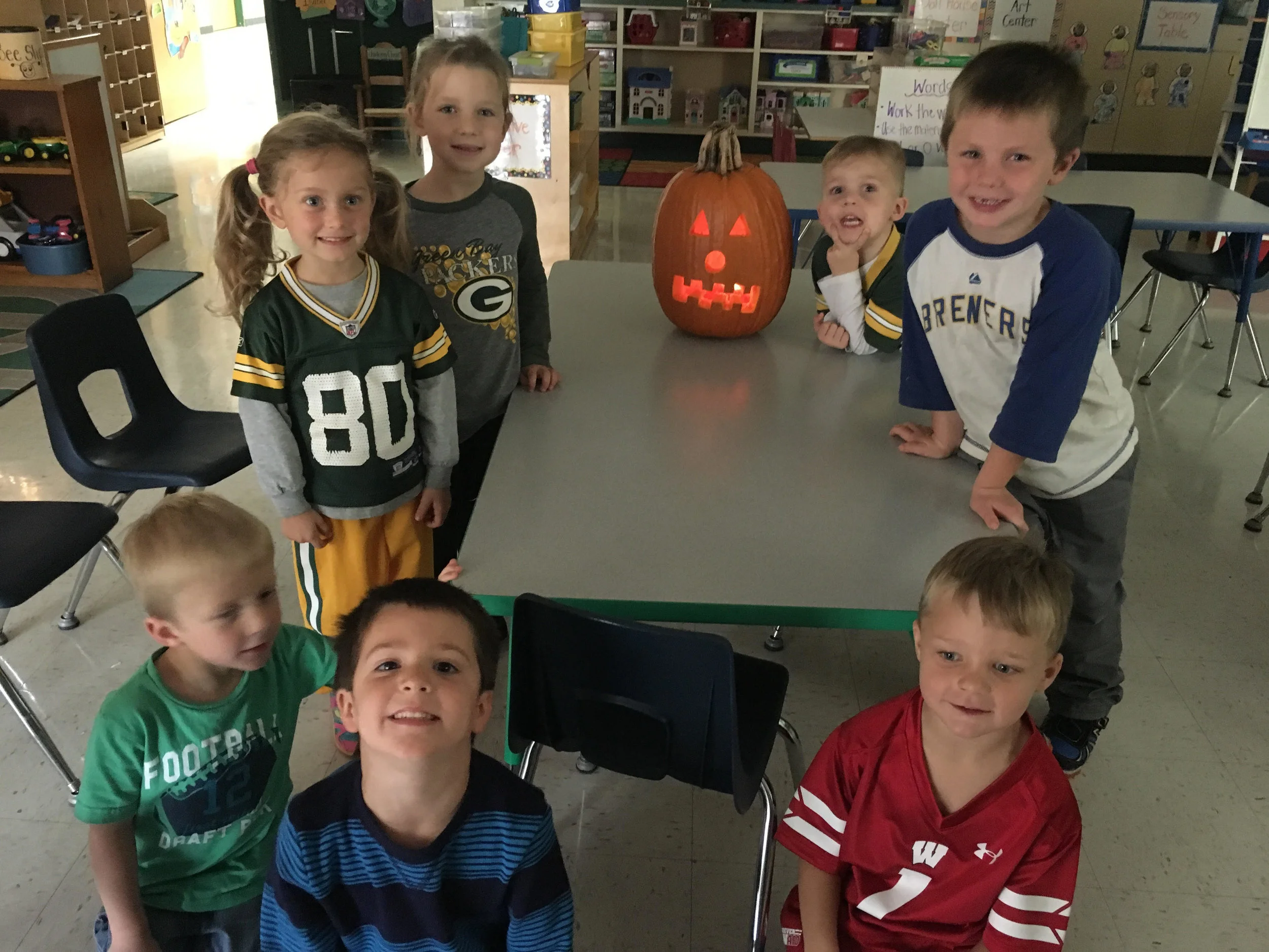 Group picture with the pumpkin we carved