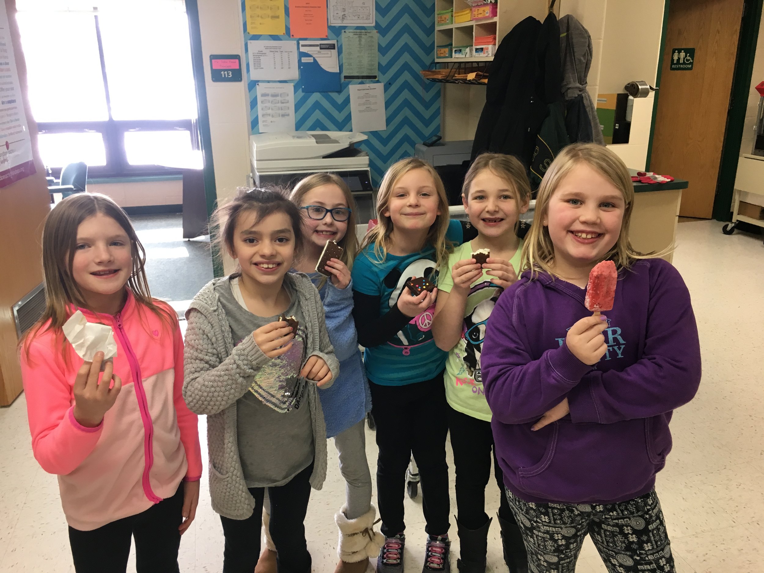 PBIS “Dessert with a Friend” Winners enjoying their treat in the office today!