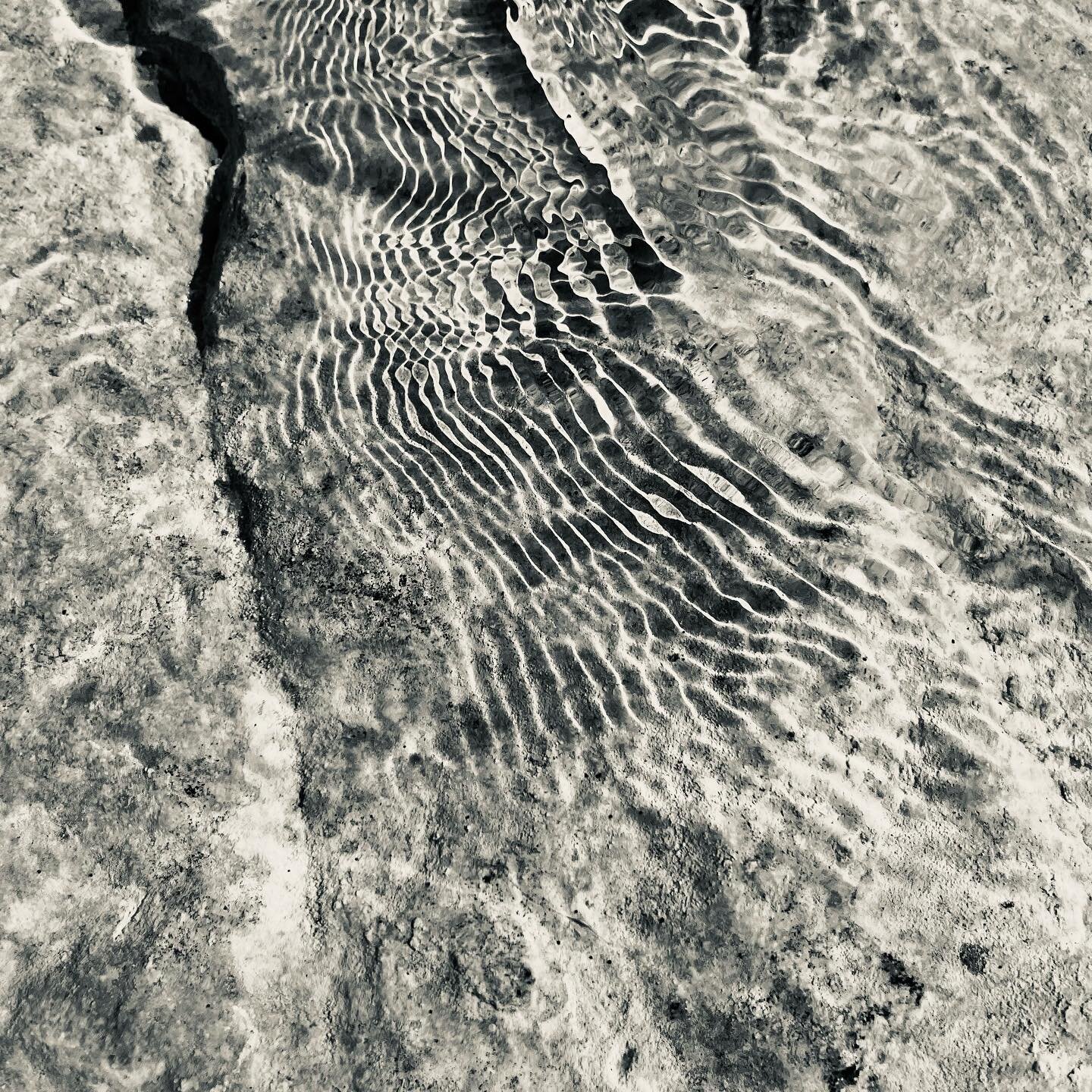 Ripples and waves visible because of refraction of light and topography on water surface caused by waves. Other than that&hellip; just taking pictures of calming scenes.