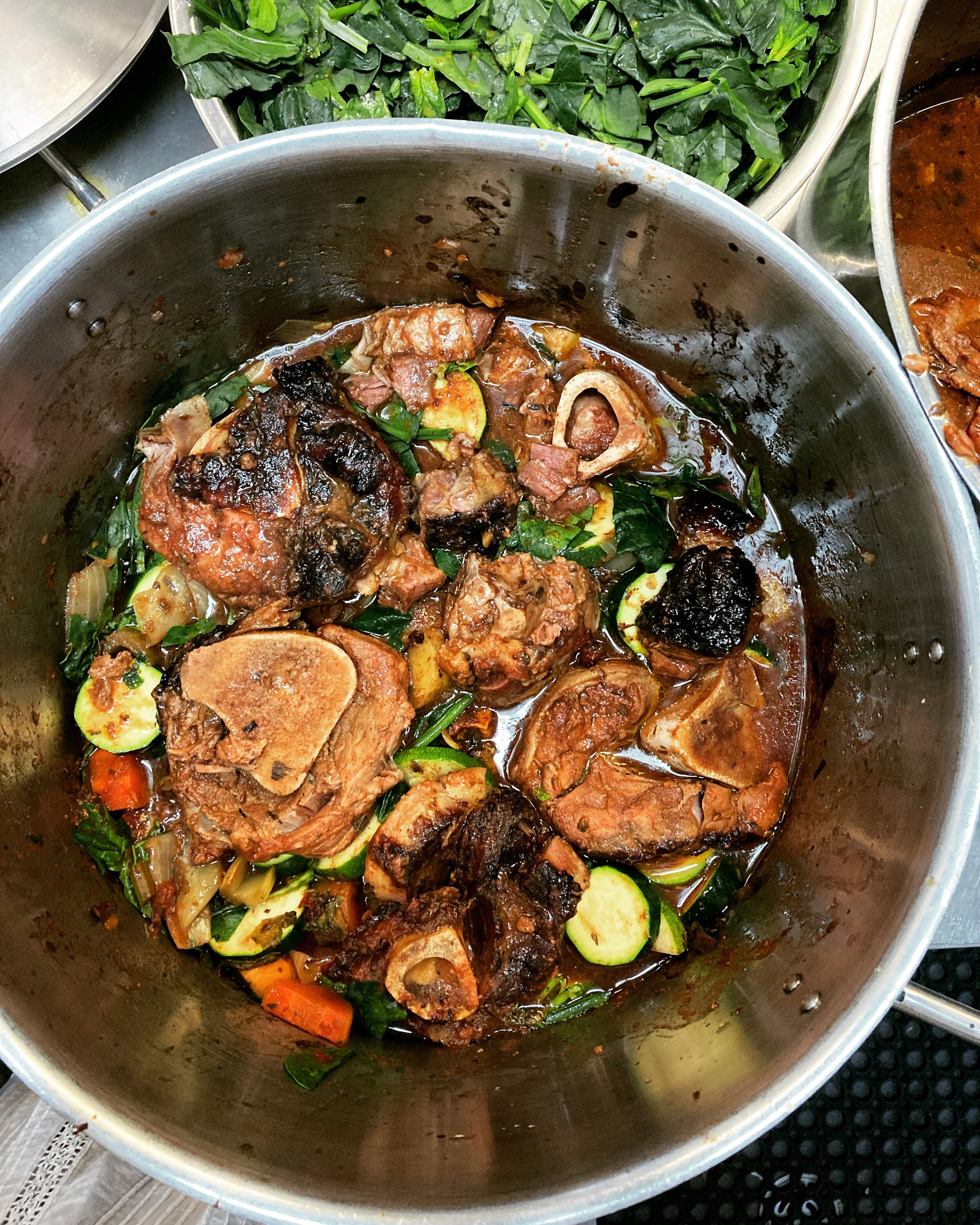 Organic veal osso bucco casserole with zucchini, greens, and bone marrow – slow-cooked in nourishing broth