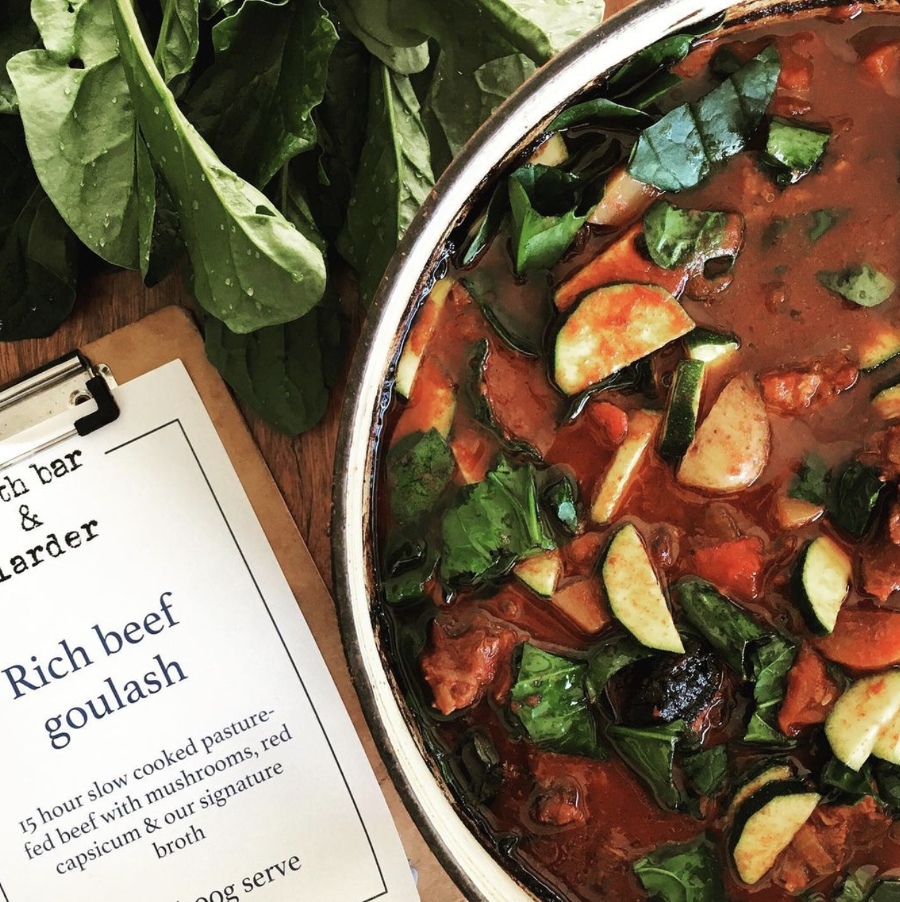 Hungarian beef goulash with spinach, zucchini, and paprika-rich broth – slow-cooked with grass-fed beef and signature stock