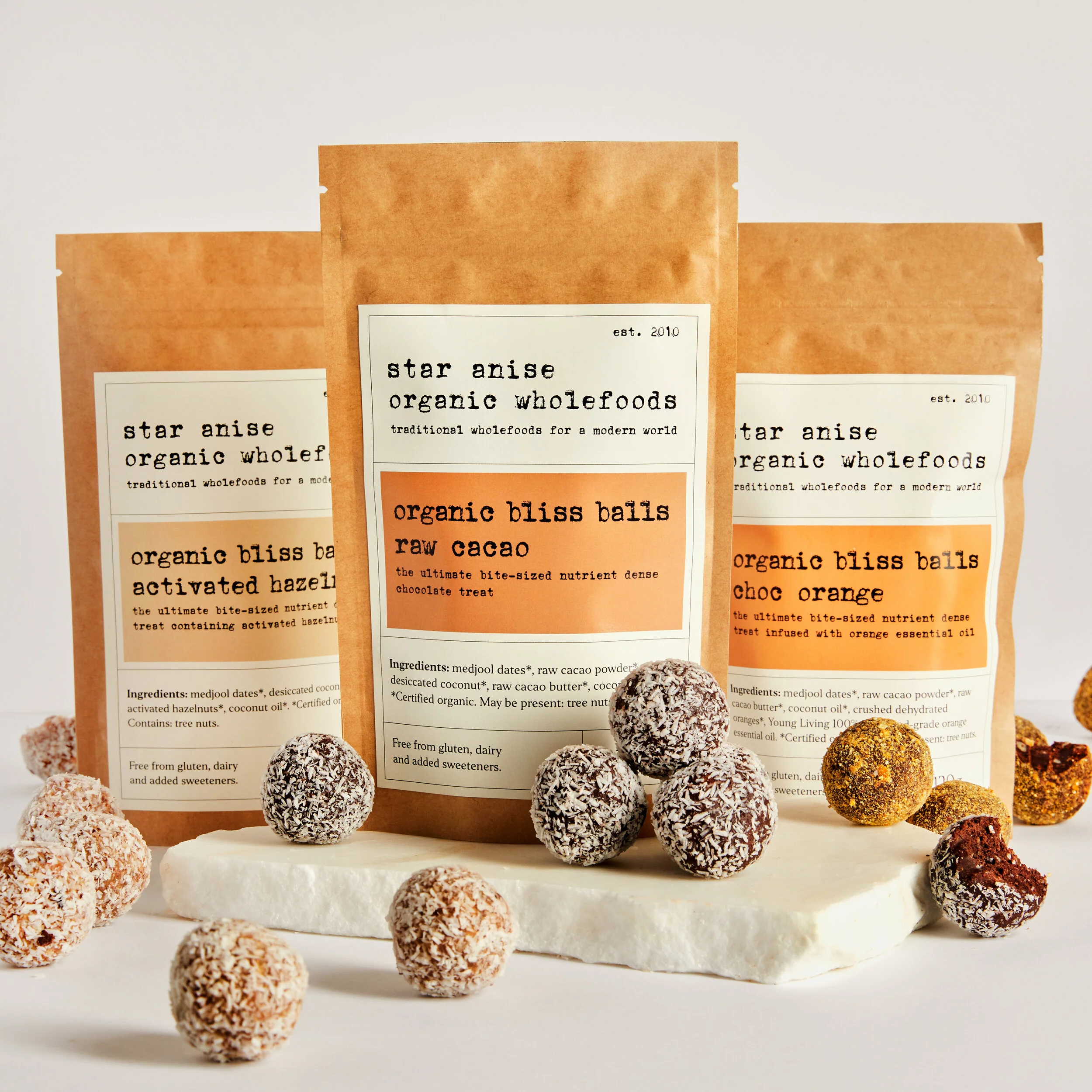 Three flavours of organic bliss balls – Activated Hazelnut, Raw Cacao, and Choc Orange – gluten-free and sweetened with medjool dates