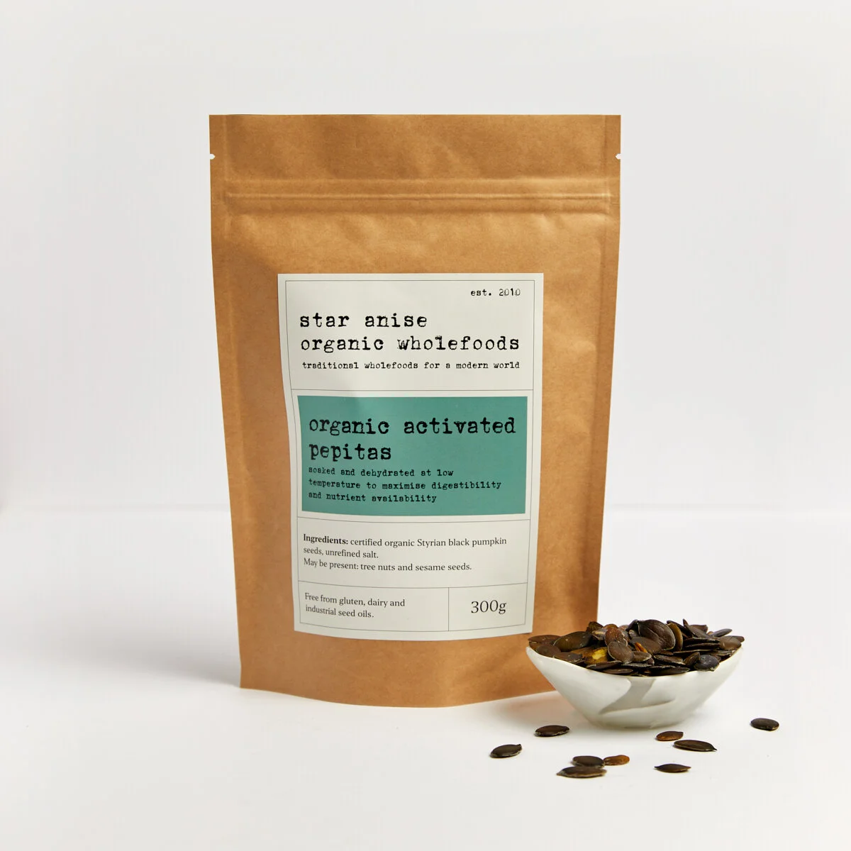 300g bag of organic activated Styrian pepitas with bowl of pumpkin seeds