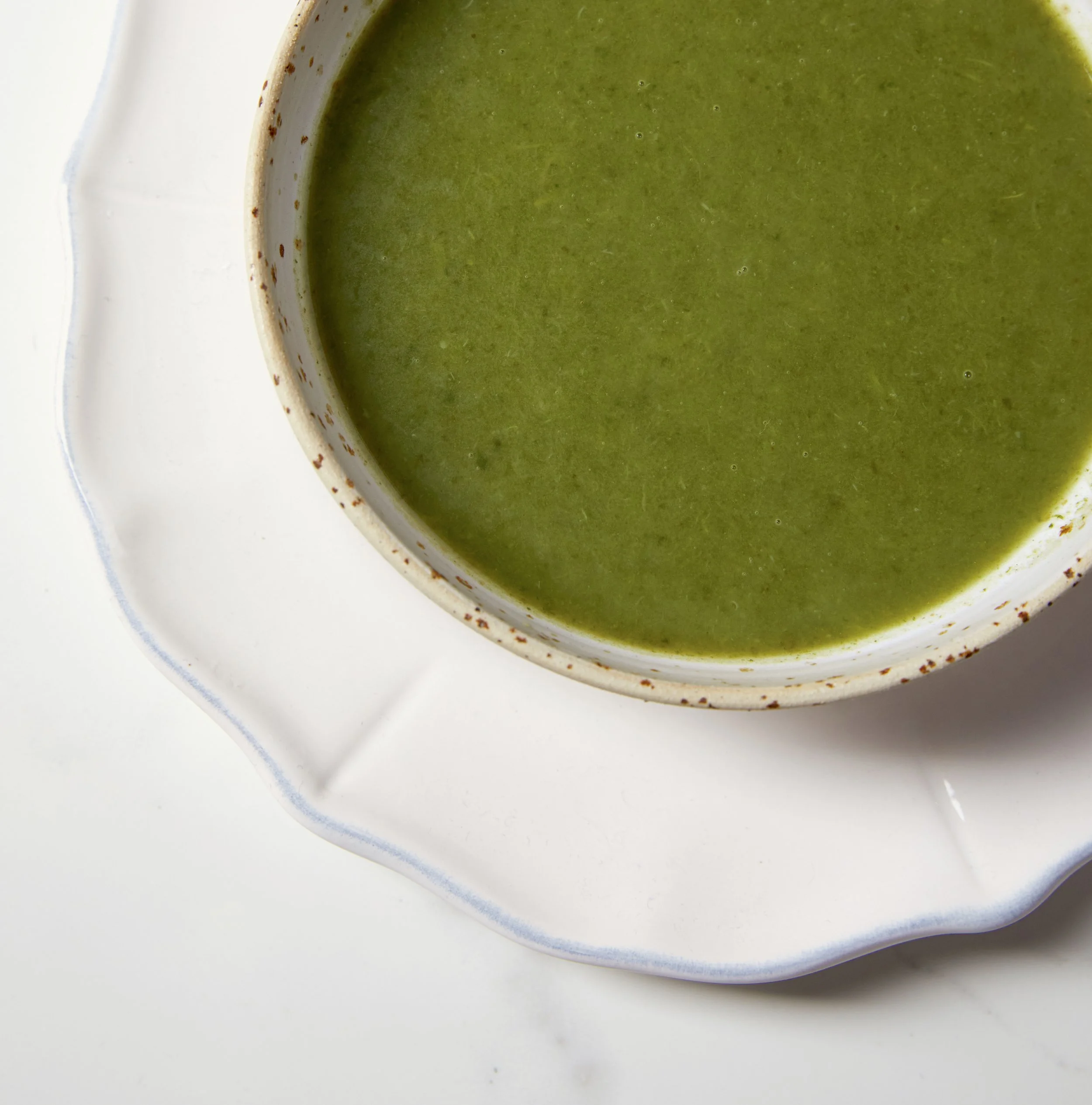 Creamy green soup made with seasonal organic vegetables and chicken bone broth – gluten-free and nutrient-rich