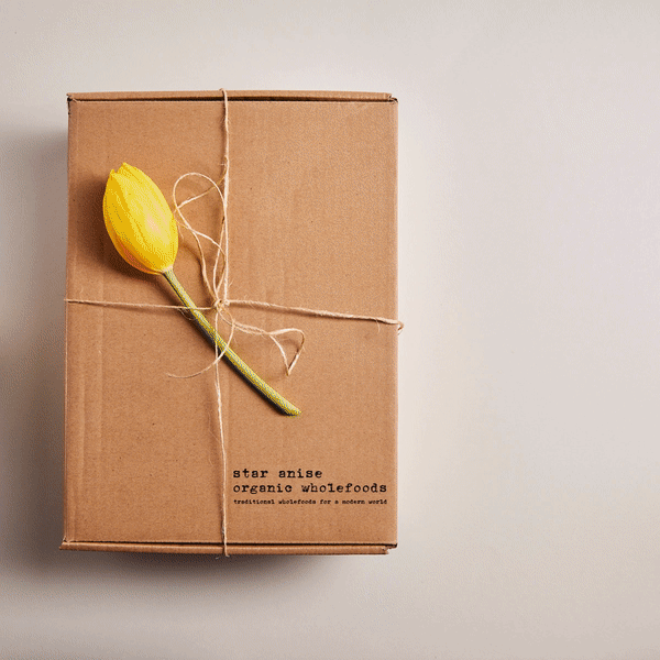 Unboxed postpartum food pack including organic broth, pâté, soup, crackers, bars and snacks