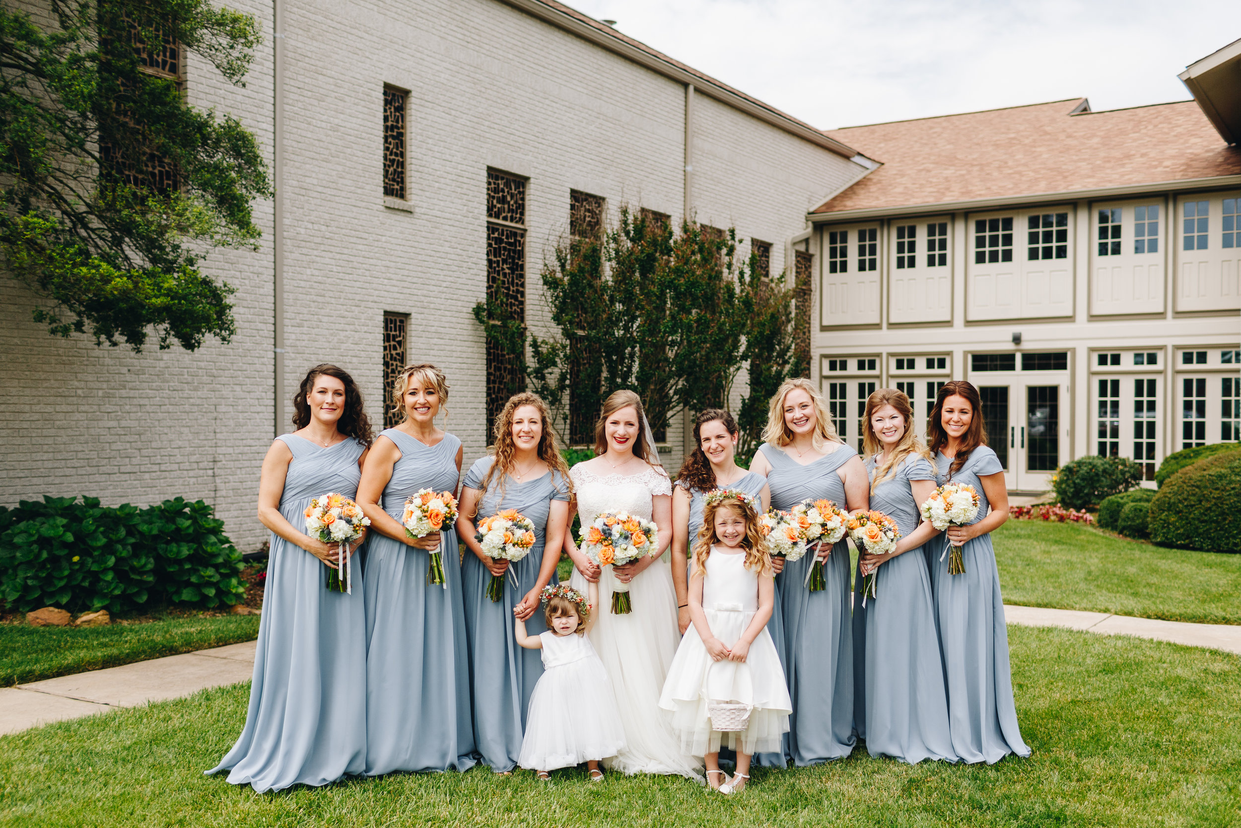 Bridesmaids portraits with steel blue dresses