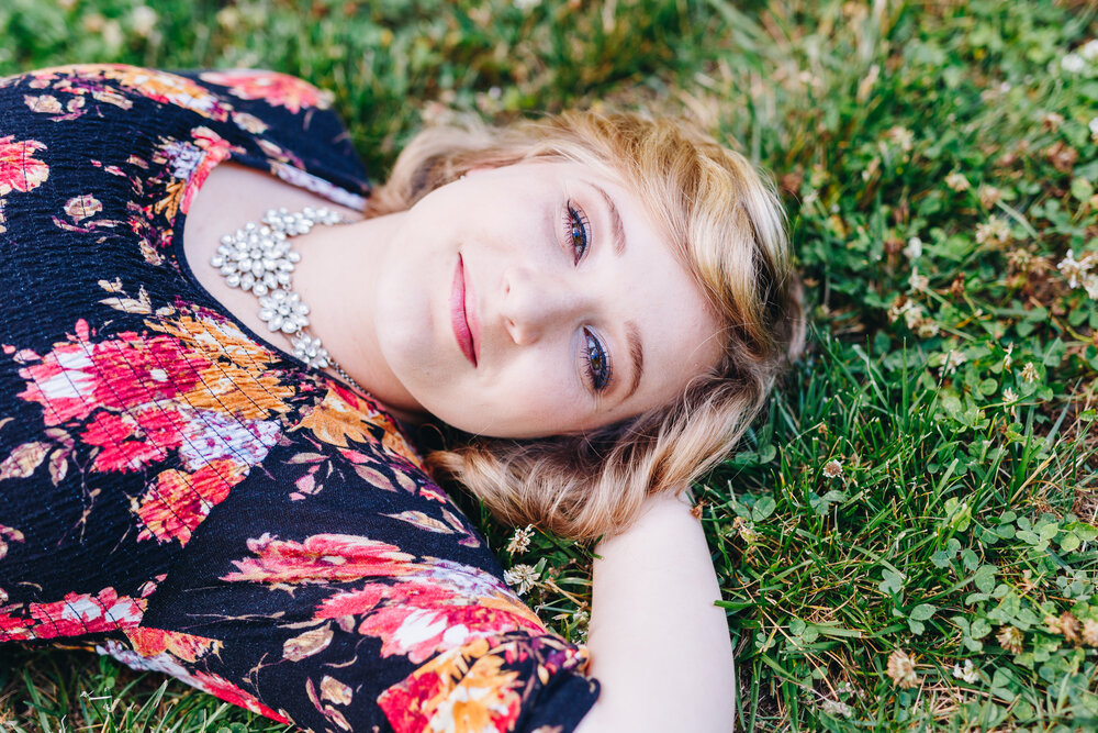 Laying in grass portraits