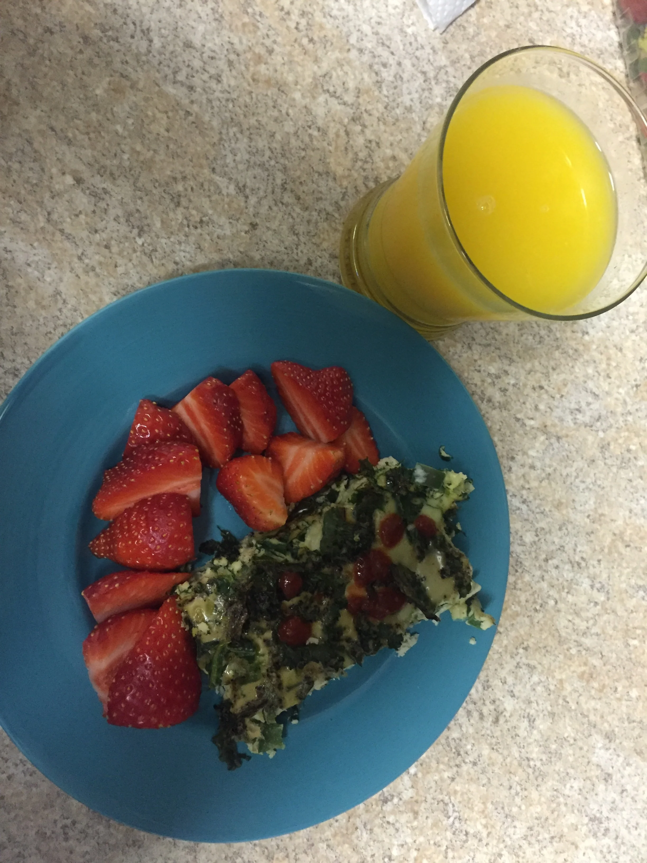 I made an egg, kale, spinach and green peppers casserole for breakfast. The OJ isn't mine; it's not part of the plan. I eat the fruit with my eggs or in my oatmeal. 