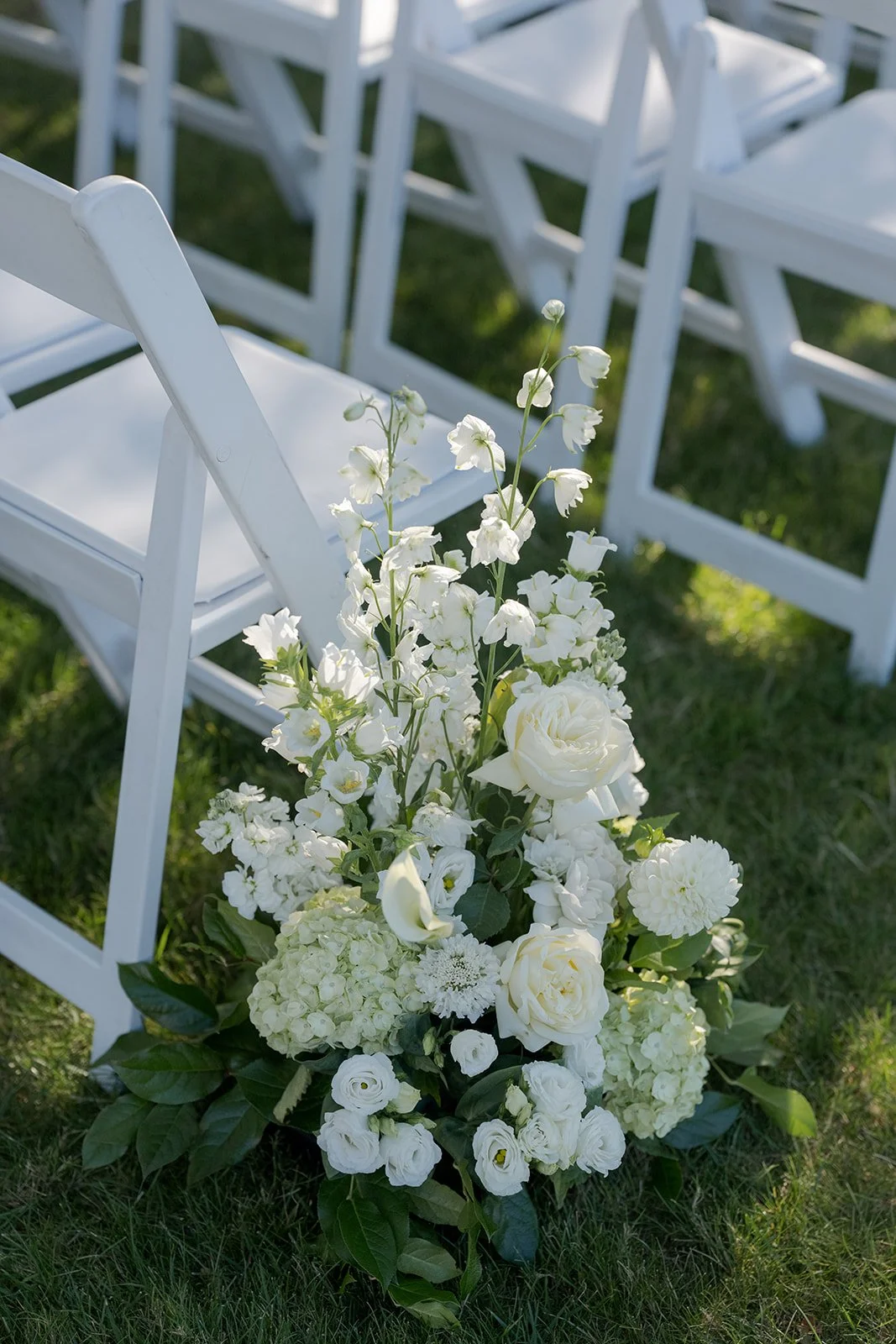 wedding-aisle-flowers-at-stamford-yacht-club-ct.jpg