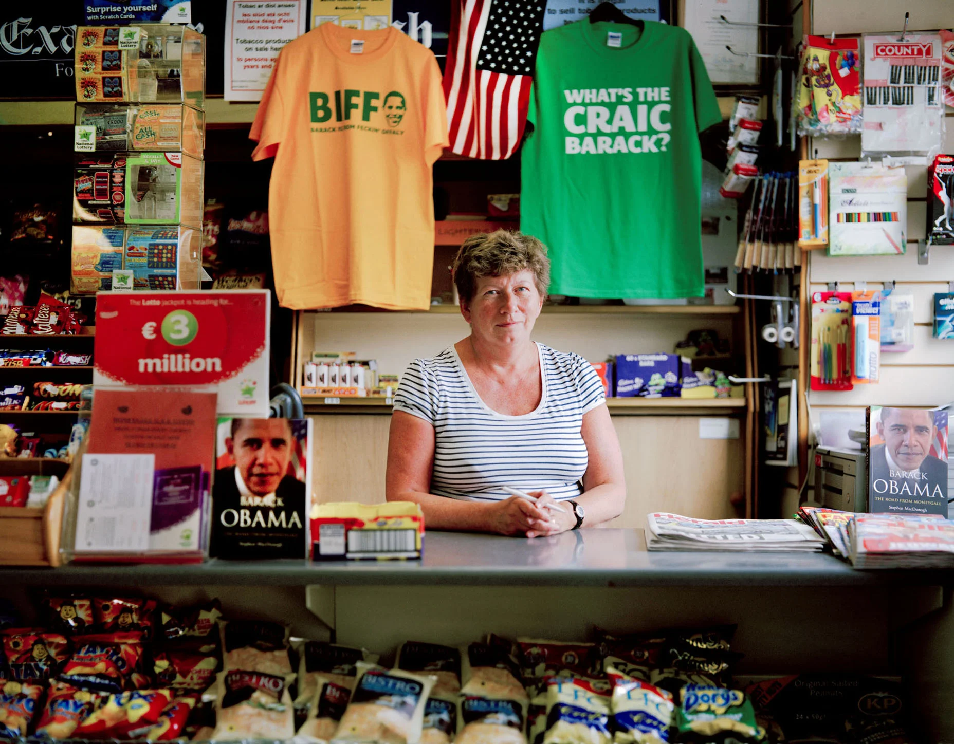 “My name is Barack Obama, of the Moneygall O’Bamas and I’ve come home to find the apostrophe we lost somewhere along the way.” On 23 May 2011, President Barak Obama and his First Lady, Michelle Obama, visited the small village of Moneygall, the president’s ancestral home, as part of a visit to Ireland. During the 2008 presidential campaign, an Irish-American genealogist found that then-Sen. Obama had a great-great-great-grandfather named Falmouth Kearney, a Moneygall resident who left for the US at 19. Although its population of roughly 320 people is smaller than the typical entourage of an American president on a foreign state visit, Moneygall has wholeheartedly embraced its most famous great-great-great-grandson. American flags and Irish tricolors line the village’s main street, which is crammed with as much Obamiana as the place can take. There’s the Obama Cafe and Gift Shop, which sells T-shirts reading “Is Feidir Linn” (Gaelic for “Yes We Can”), hurling sticks with the president’s face and reproductions of Shepard Fairey’s famous Obama portrait superimposed over pictures of Moneygall.