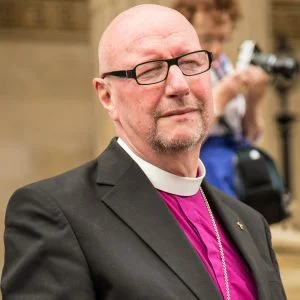 Rt Revd Bishop Paul Bayes at Liverpool Pride 2017, wearing the rainbow cross presented to him by the Open Table community during his first visit in July 2015.