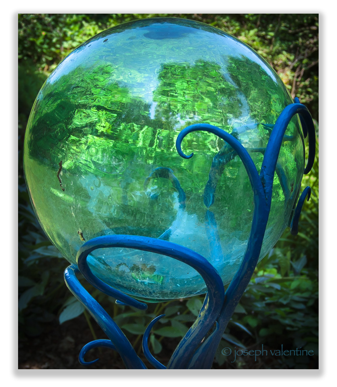 This glass reflecting ball at Bedrock Gardens in Lee, New Hampshire is doing its job!