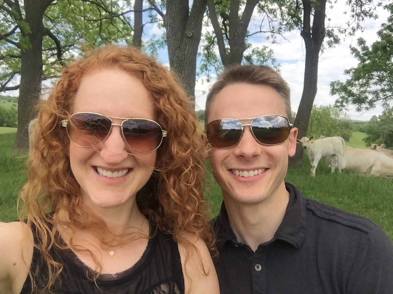 Oh, don't mind us. We're just the cliche city folk who are gonna take a selfie with your cows...