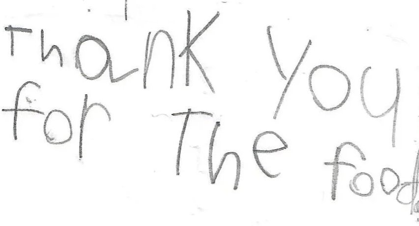 Note from a visitor’s child, saying “Thank you for the food."