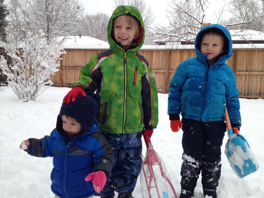 Quin (middle) today, age 7. Leader, good citizen. We hope.