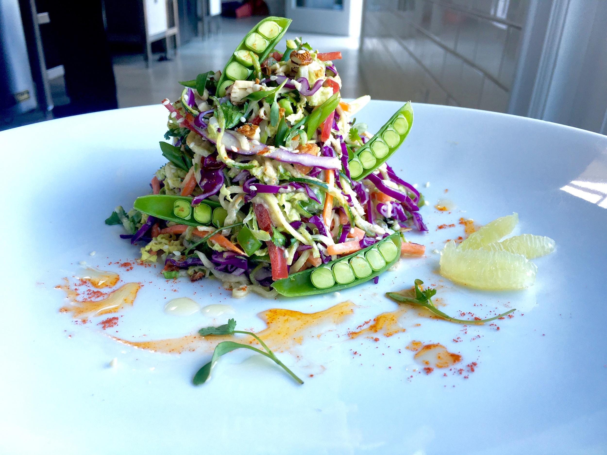 Sesame Noodles // almond chili sauce / zucchini noodles / tamari almonds - lime supreme on the side. We made activated almond butter for the sauce - it was delish!
