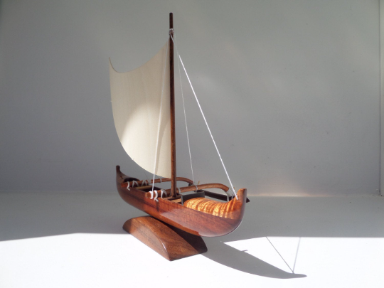 This Hawaiian fishing canoe outrigger is carved using Koa wood.