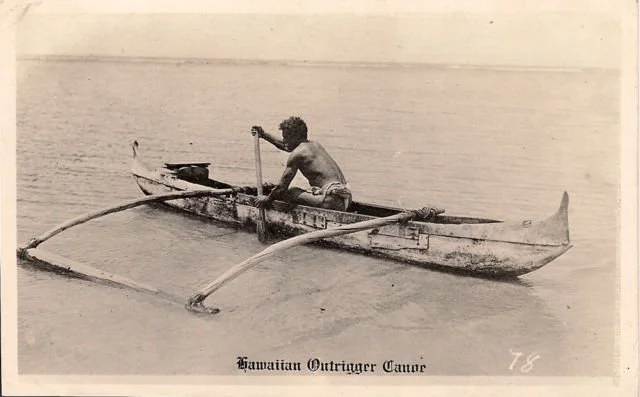  A photo dating back to the beginning of the 20th century showing a native paddling along the shore. 