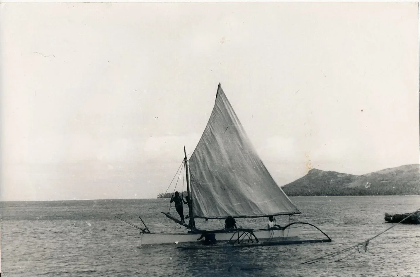  Tahitian outrigger with sprit sail. 