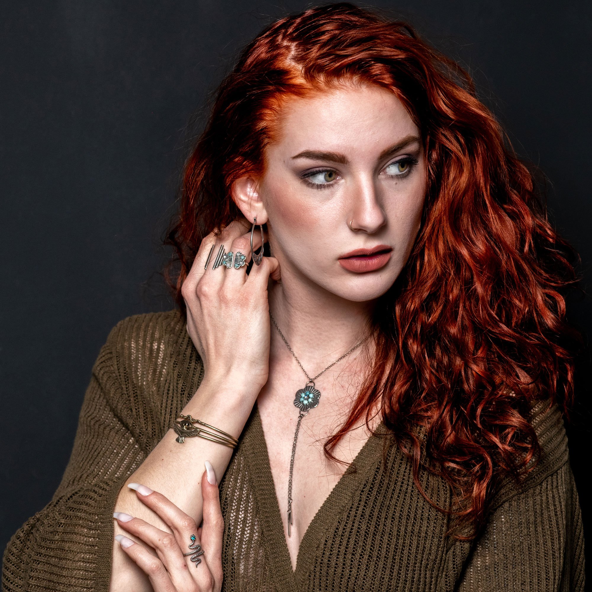 Flower-bolo,-snake-ring,-hoop-earrings.jpg