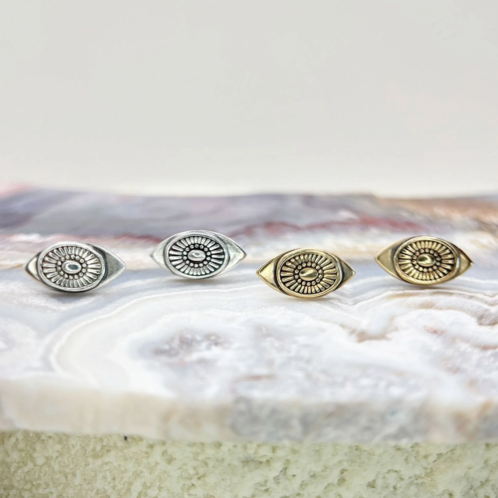 Cosmic-eye-post-earrings-both.jpg