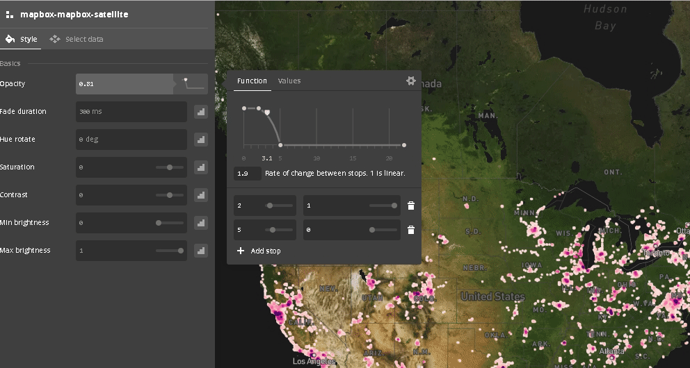Adding a zoom-driven opacity function to transition from a satellite map to a dark data viz map.