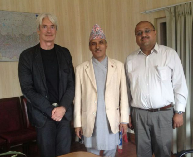 Nepal's Chief Secretary Leela Mani Paudyal receives Himalayan Consensus Executive Board members Laurence Brahm and Sujeev Shakya at the Prime Minister's Office in Kathmandu