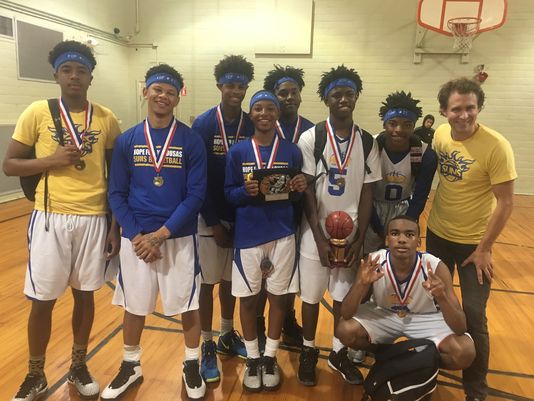 The Hope For Opelousas basketball team won its third straight Athletes For Christ League title. Pictured are: Ty Thomas, Chris Sapp, Kevin Coleman, Keith Biagase, Leo Franklin, Emmett Sanders, Isaiah Charles, Kevin Thomas, and HFO Executive Director Loren Carriere.