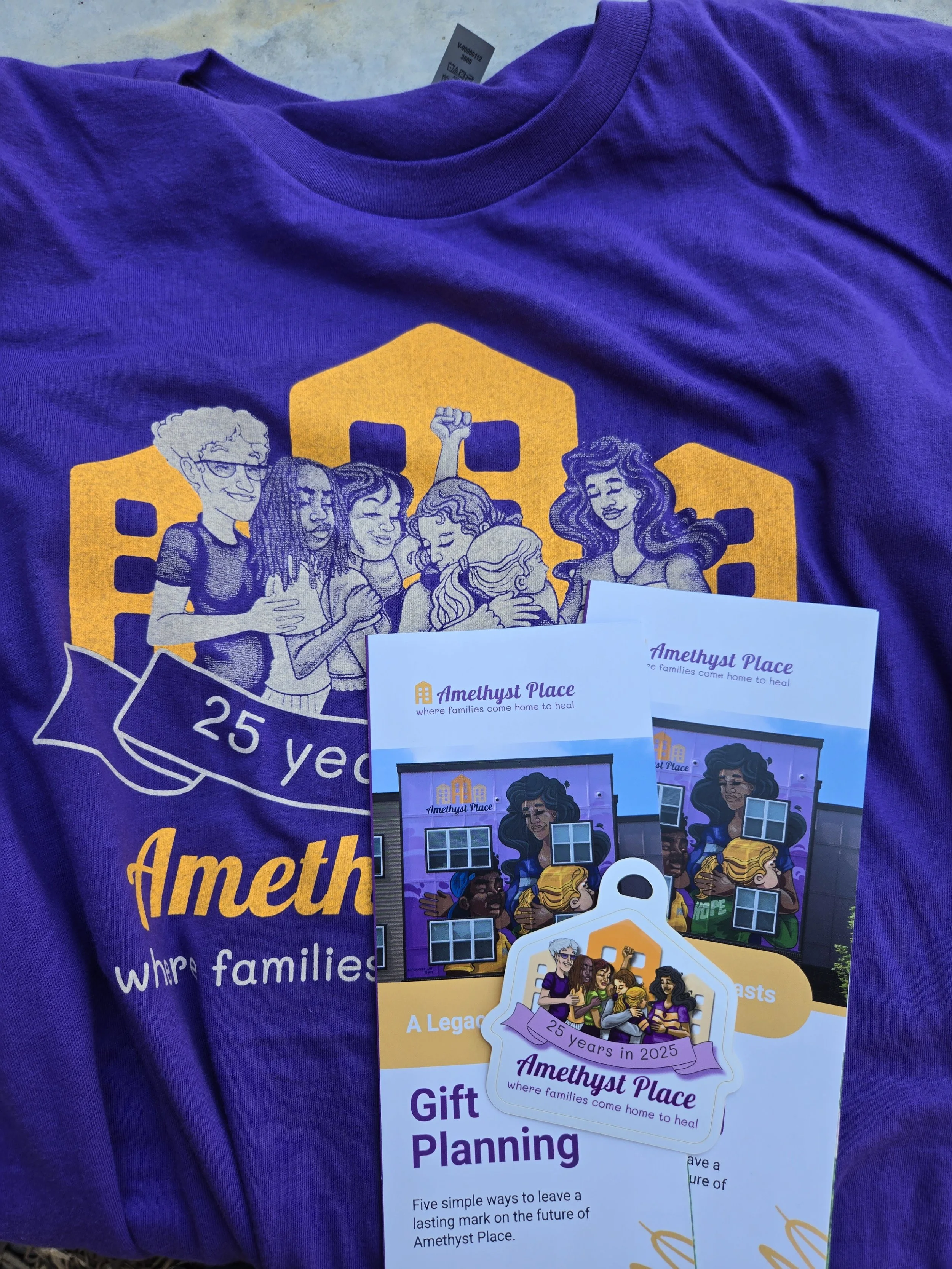 T-shirt, pamphlet and stickers featuring the mural design for the Amethst Place Grand Opening Ceremony