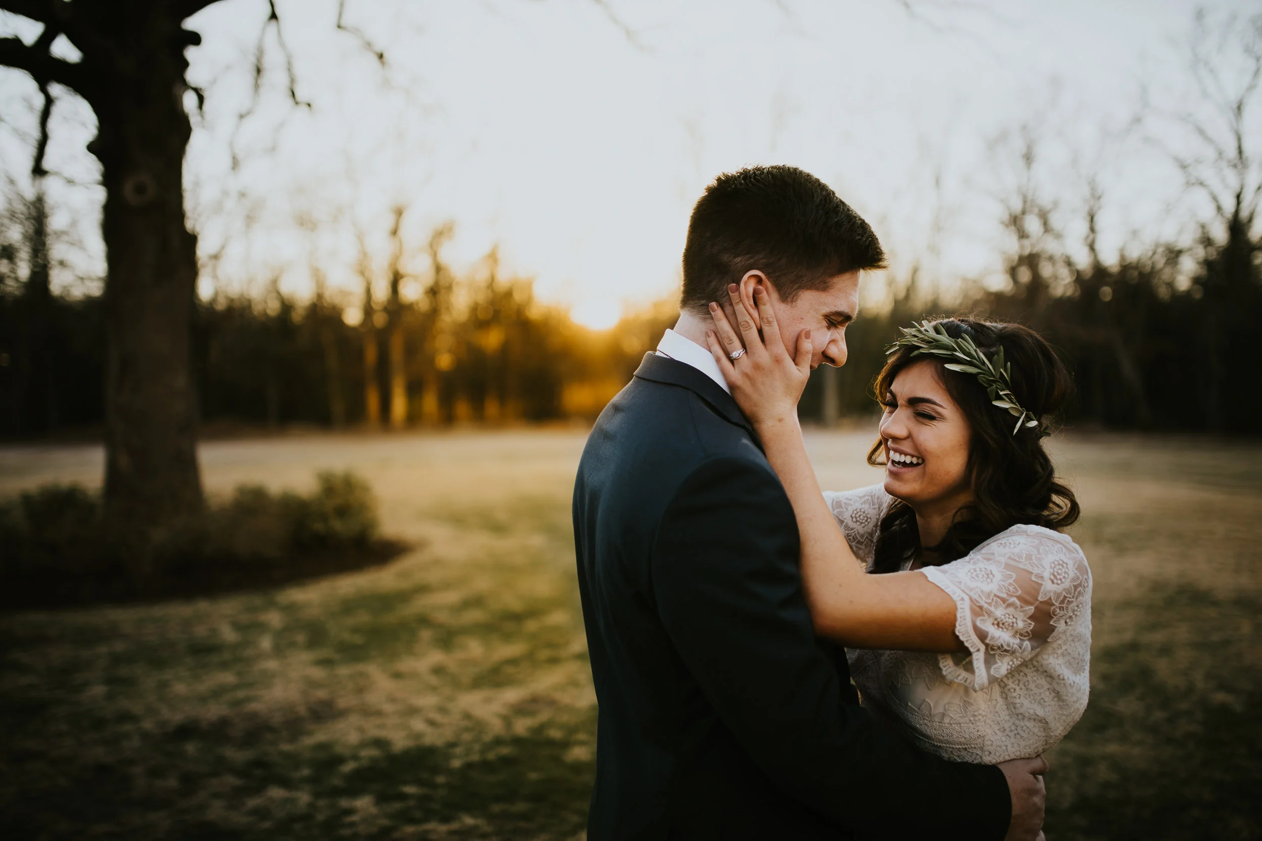 Bride and groom couple laughing with each other right after their wedding ceremony. Shot by David C. Allen Photography at The White Sparrow