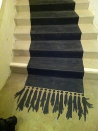 Painted Runner with Tassels – This is a way to break up the monotony of a traditionally painted staircase. The tassels add whimsy and even more interest. (bjtodesigns.com)