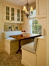 We love this stylish nook. This built-in banquette really packs in a ton of storage in a small space with its under-the -bench drawers and cabinetry above. (Ross Chapel for HGTV)